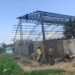 Babinsa Koramil 421-09/Tanjung Bintang Monitoring Pembangunan Gedung KDKMP di Desa Purwodadi Dalam