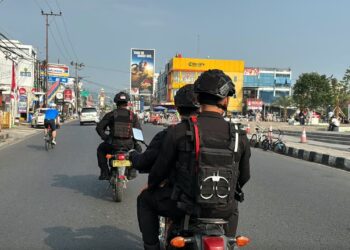 Tingkatkan Keamanan Kota, Personel Brimob Lampung Laksanakan Patroli Dialogis ke Sejumlah Lokasi Strategis