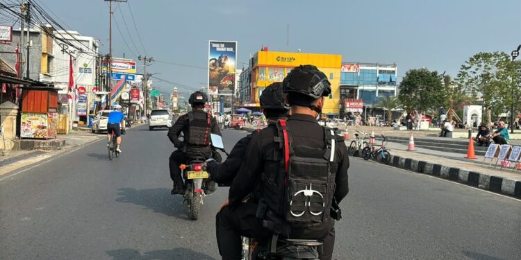 Tingkatkan Keamanan Kota, Personel Brimob Lampung Laksanakan Patroli Dialogis ke Sejumlah Lokasi Strategis