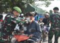 Antisipasi Abu Vulkanik Anak Krakatau, Korem 043/Gatam Bagikan Masker dan Bersihkan Sekolah di Metro